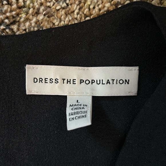 Black, large, mid-length dress. - Picture 2 of 5